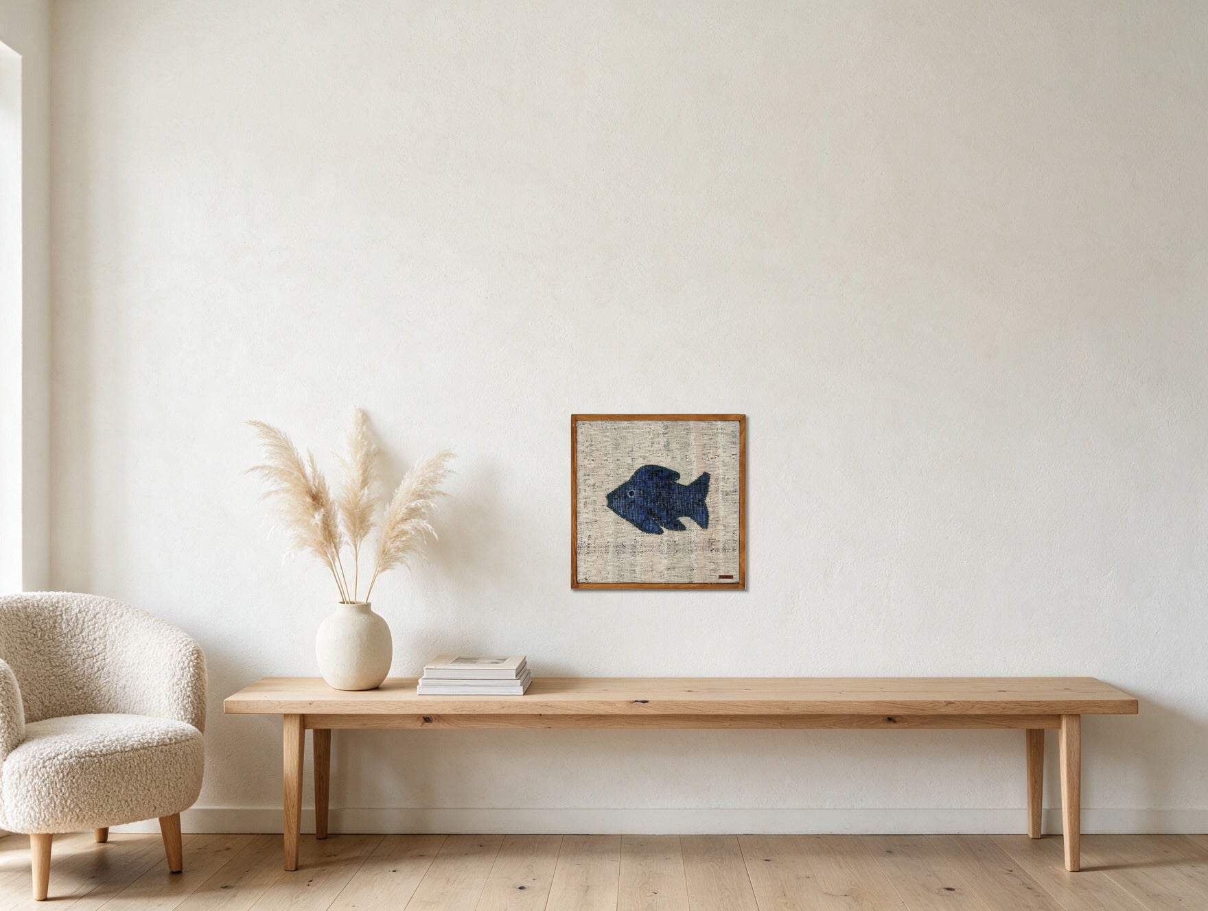 Indigo Kilim Fish on Flecked Cream woven wall art shown hanging in a styled room, for scale - WA-FSH-IND-5050-019