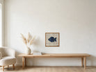Indigo Kilim Fish on Flecked Cream woven wall art shown hanging in a styled room, for scale - WA-FSH-IND-5050-019