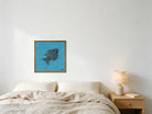 Navy Kilim Fish on Turquoise woven wall art shown hanging in a styled room, for scale - WA-FSH-NAV-5050-036