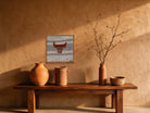 Red & Tan Kilim Bull on Grey Band woven wall art shown hanging in a styled room, for scale - WA-BUL-RED-5050-045