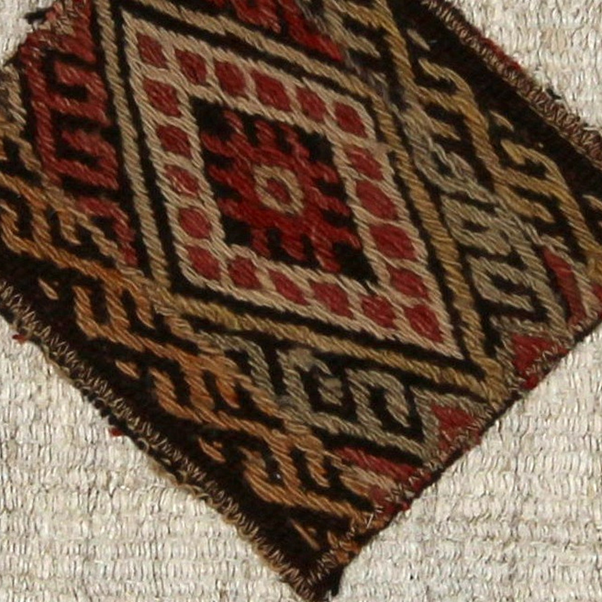 Close-up of the handwoven kilim weave - Red, Gold & Black Kilim Medallion on Cream - WA-MED-RED-5050-050 - Arconiz