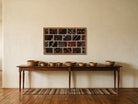 Red, Black & Teal Kilim Patchwork on Multicolor woven wall art shown hanging in a styled room, for scale - WA-PCH-RED-8855-054