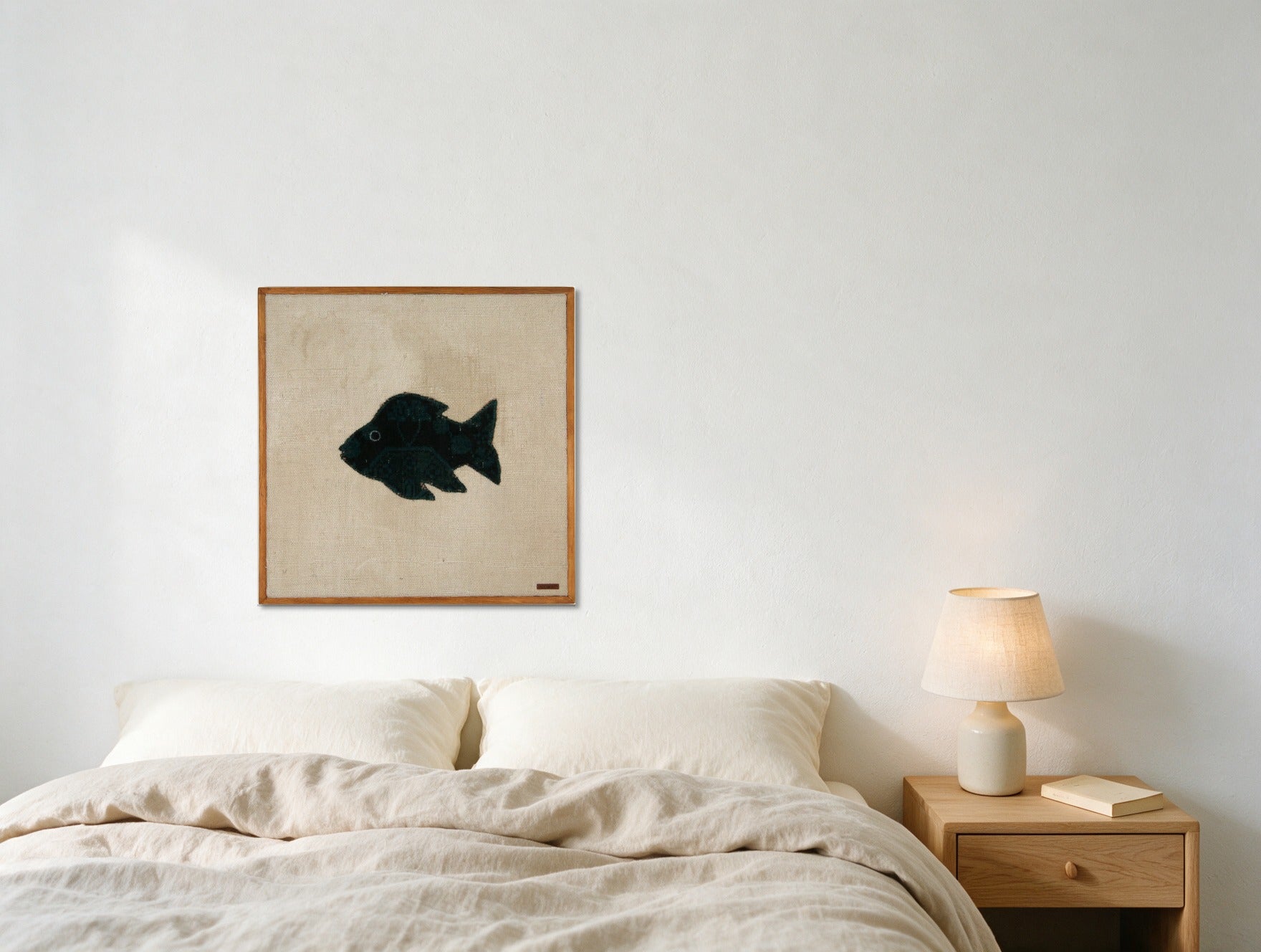 Near Black Kilim Fish on Cream woven wall art shown hanging in a styled room, for scale - WA-FSH-NEA-6060-058