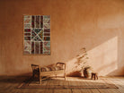 Rust & Black Kilim Patchwork on Warm Cream woven wall art shown hanging in a styled room, for scale - WA-PCH-RUS-6595-062