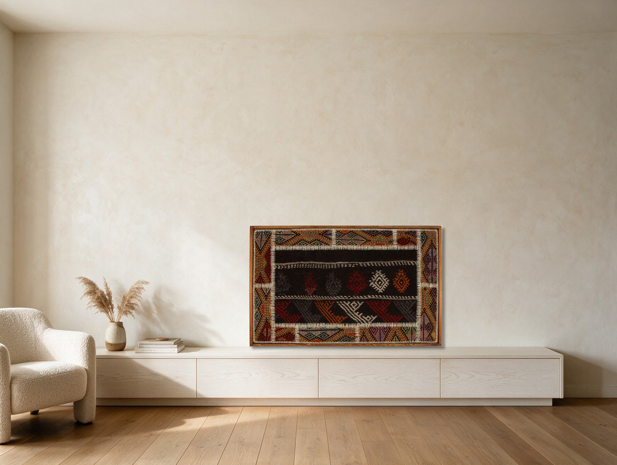 Rust & Ivory Bordered Kilim on Deep Brown woven wall art shown hanging in a styled room, for scale - WA-BRD-RUS-11069-077