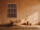 Ivory Kilim Patchwork on Deep Red & Black woven wall art shown hanging in a styled room, for scale - WA-PCH-IVO-70105-080