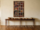 Rust & Ivory Kilim Patchwork on Warm Multicolor woven wall art shown hanging in a styled room, for scale - WA-PCH-RUS-76115-085